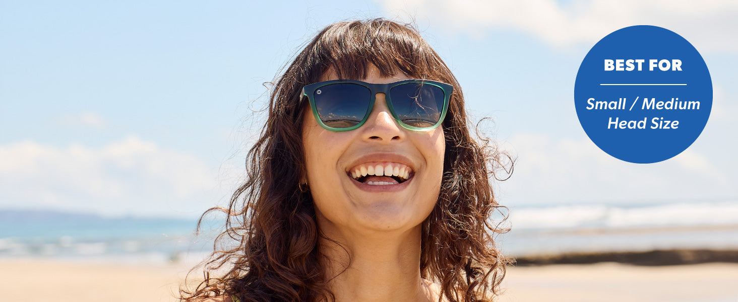 Classics are best for small to medium sized faces. Photo features a woman wearing Classics sunglasses